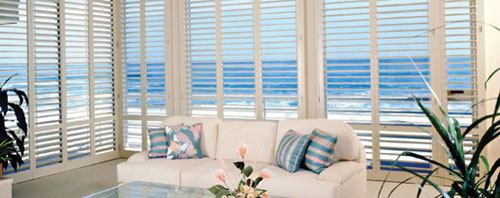 plantation shutters with a great tropical ocean view